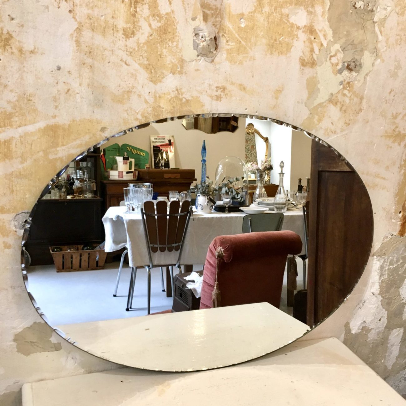 Miroir ancien oval biseauté